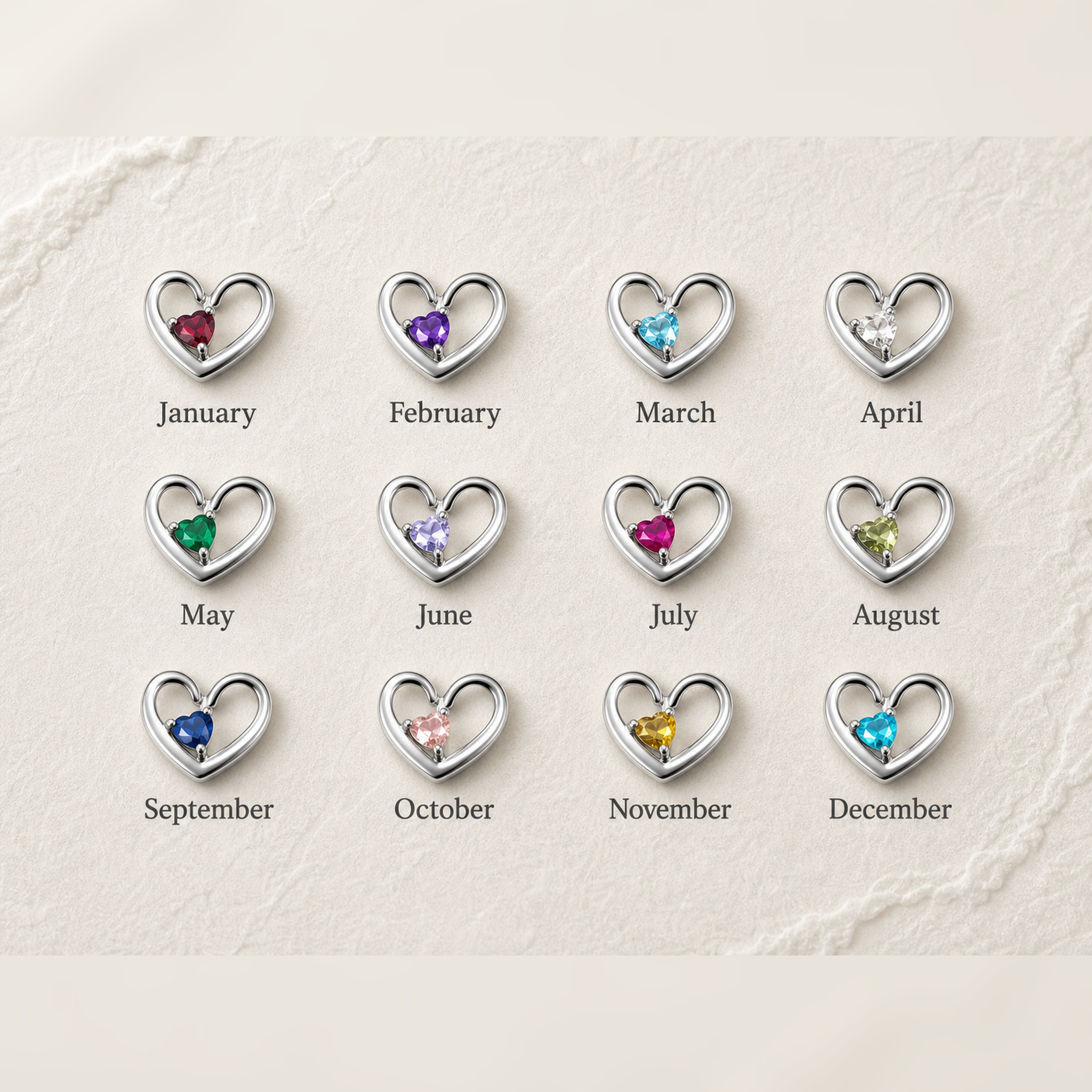 Birthstone color chart showing 12 heart pendants in rhodium, one for each month from January to December