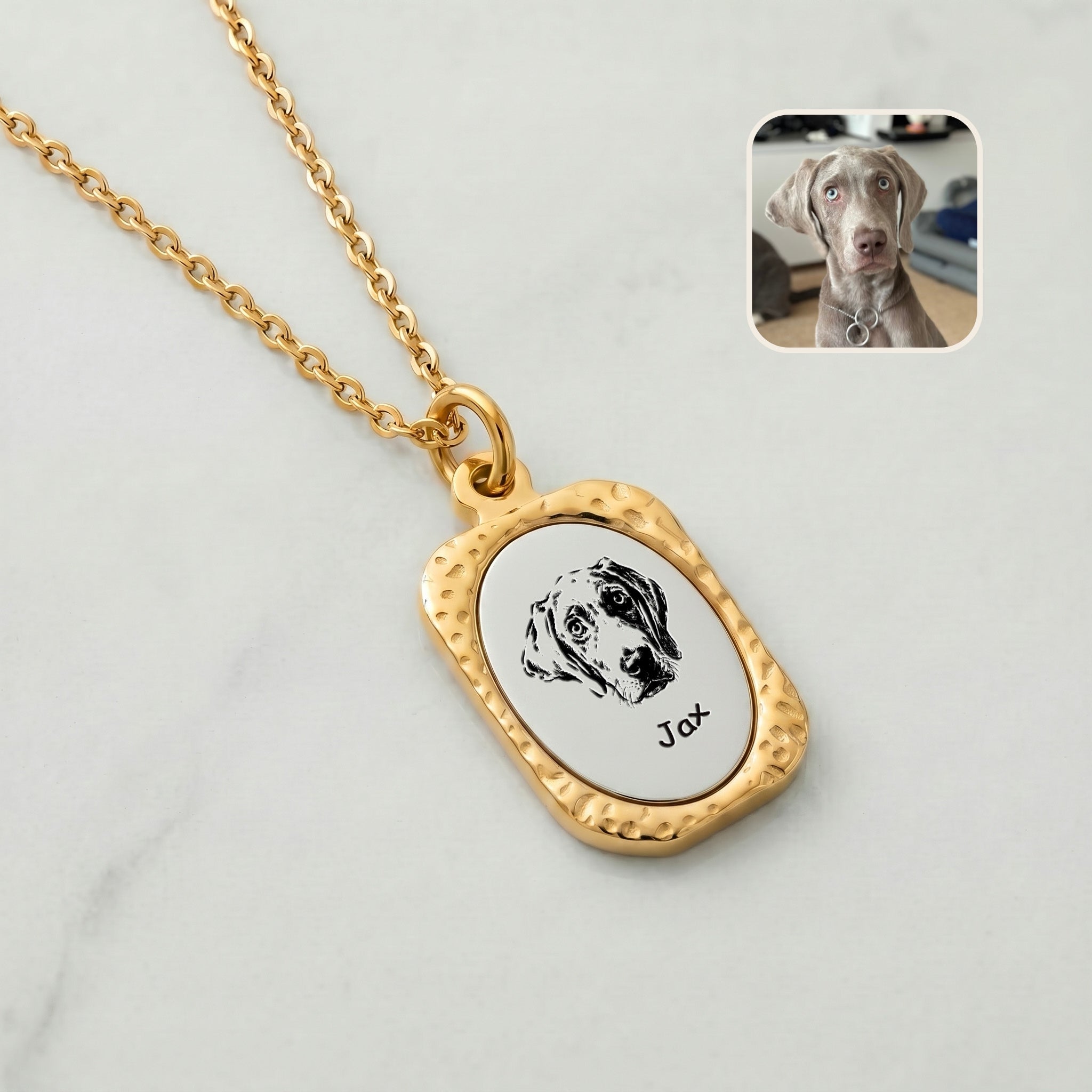 Close-up of 18K gold custom pet portrait pendant with hand-drawn Weimaraner engraving on brushed silver face