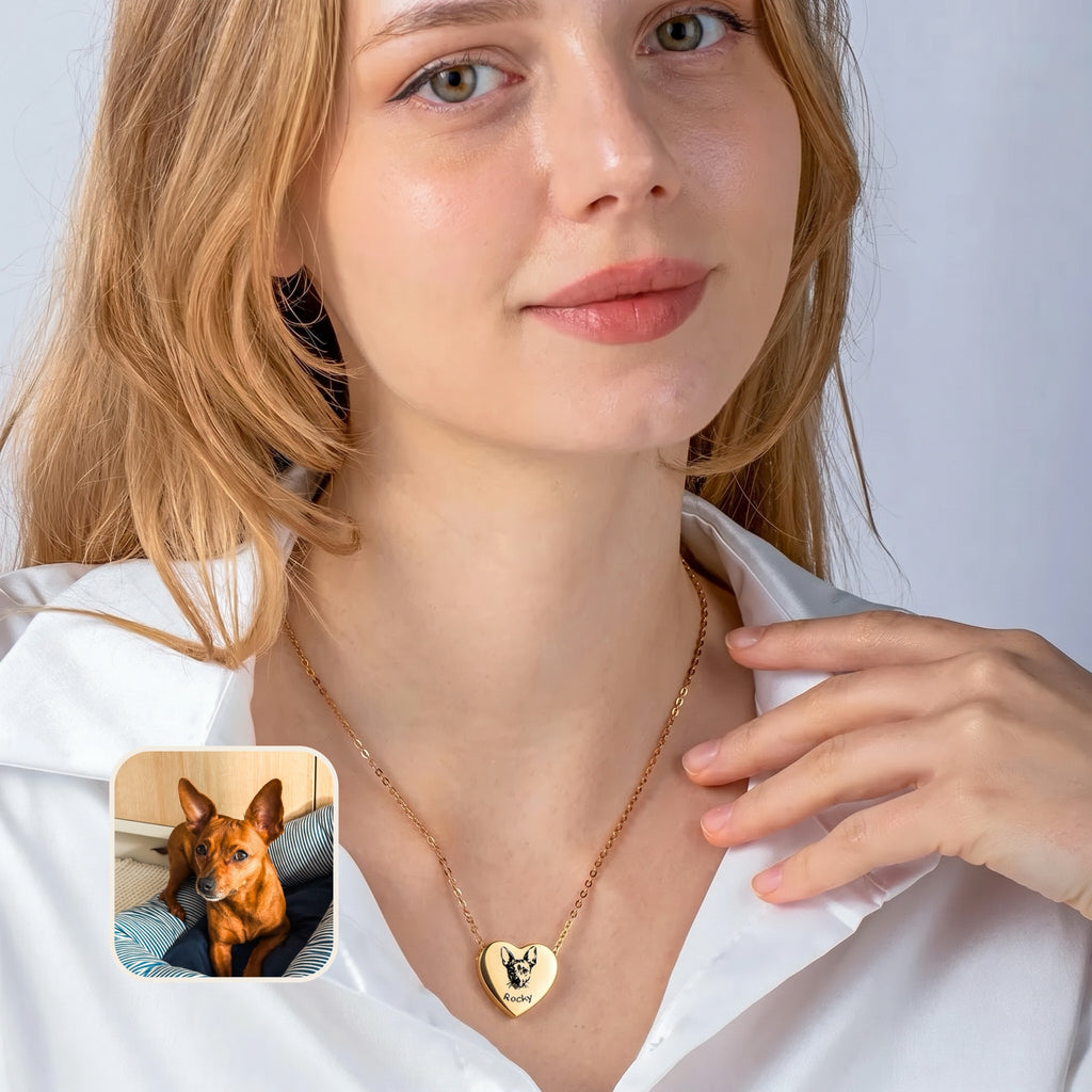 Woman wearing 18k gold pet photo heart urn necklace with pet photo reference inset