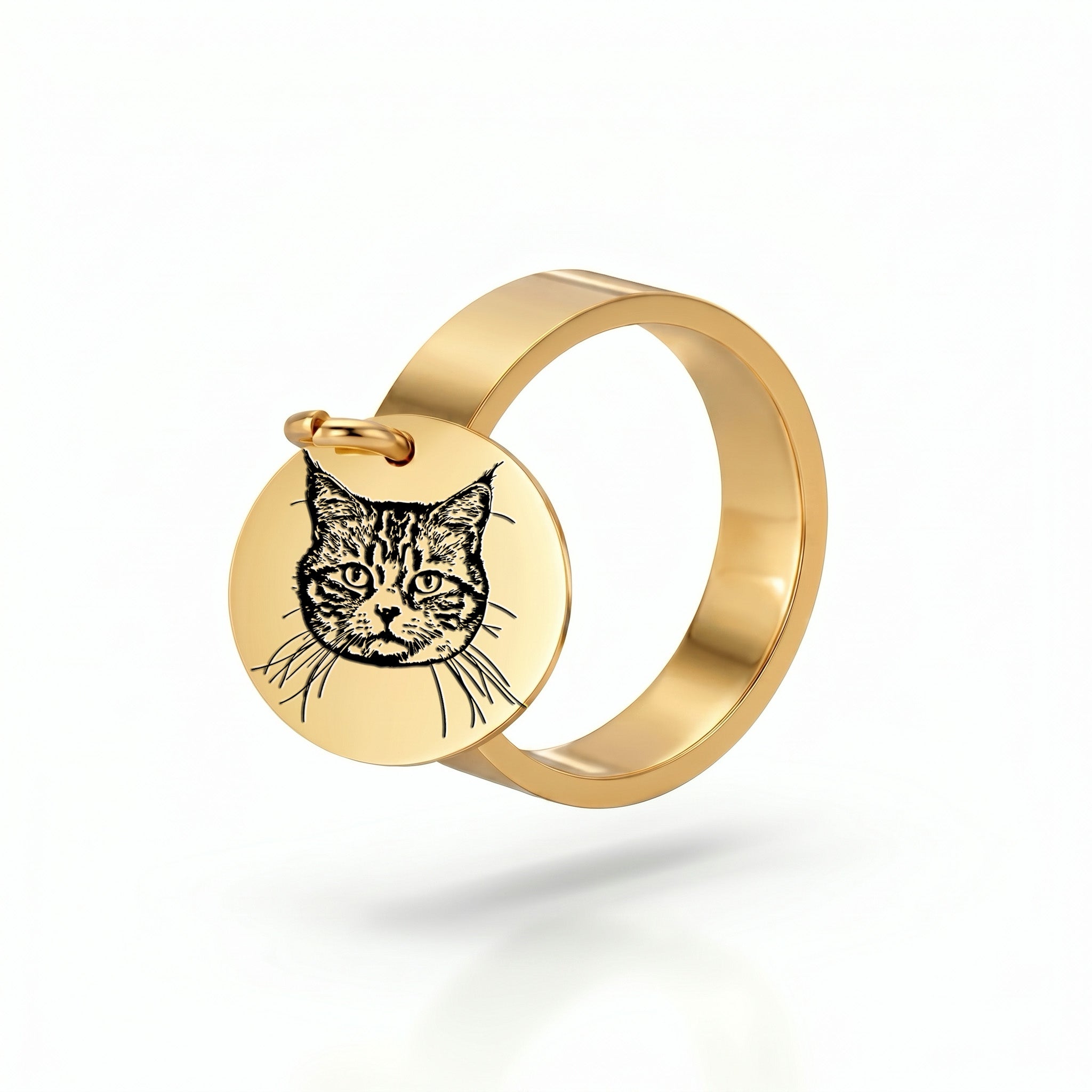 Yellow-gold disc ring with an engraved pet portrait, shown alone on a white studio background