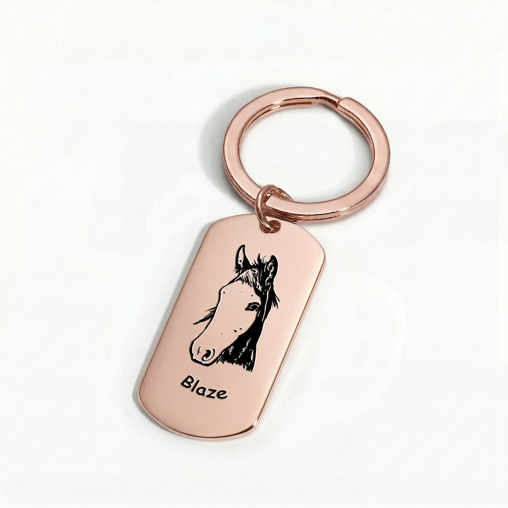 18K rose gold pet portrait dog tag keychain flat-lay on softly lit white surface, editorial product detail