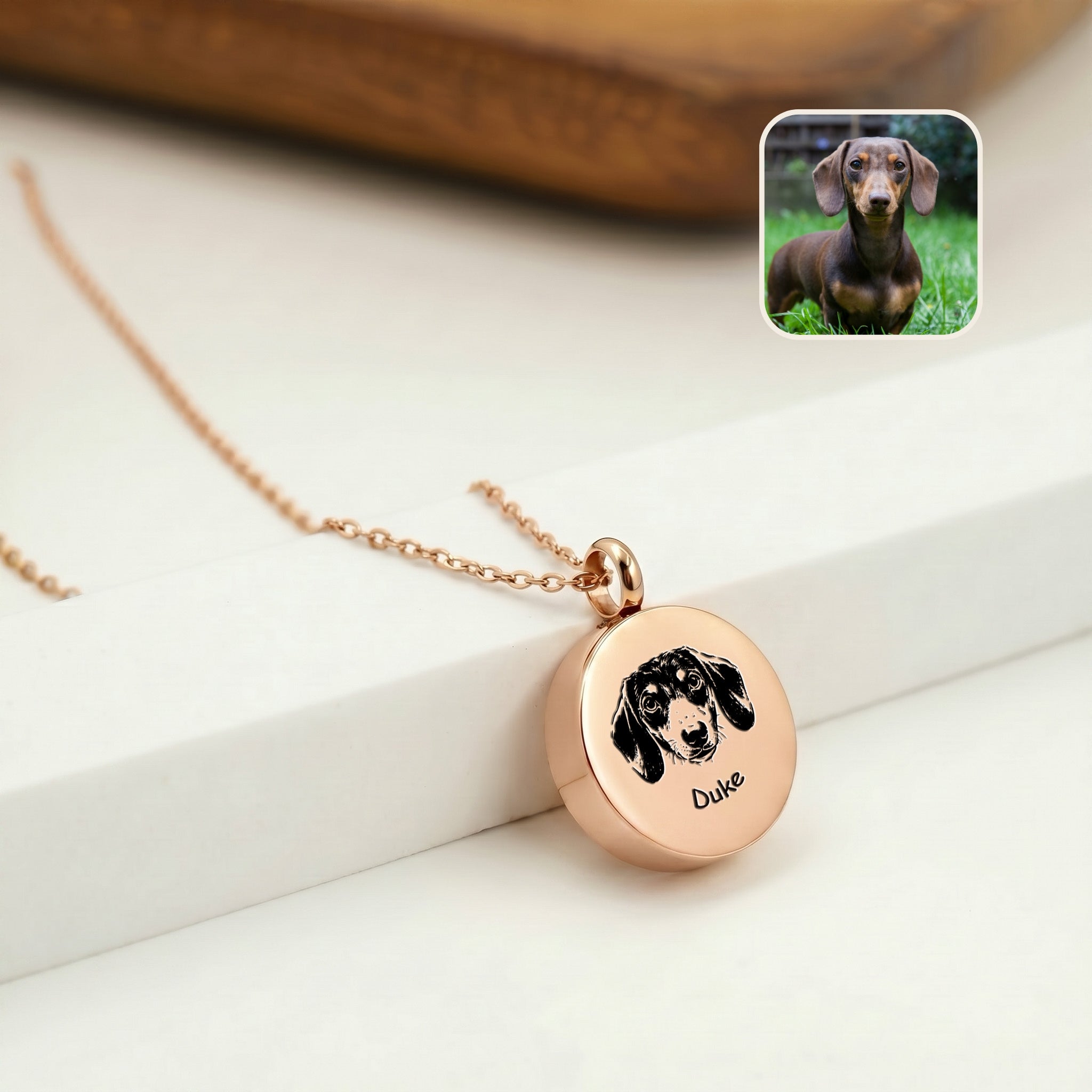 18K rose gold pet ashes necklace with hand-drawn dachshund portrait on disc urn pendant