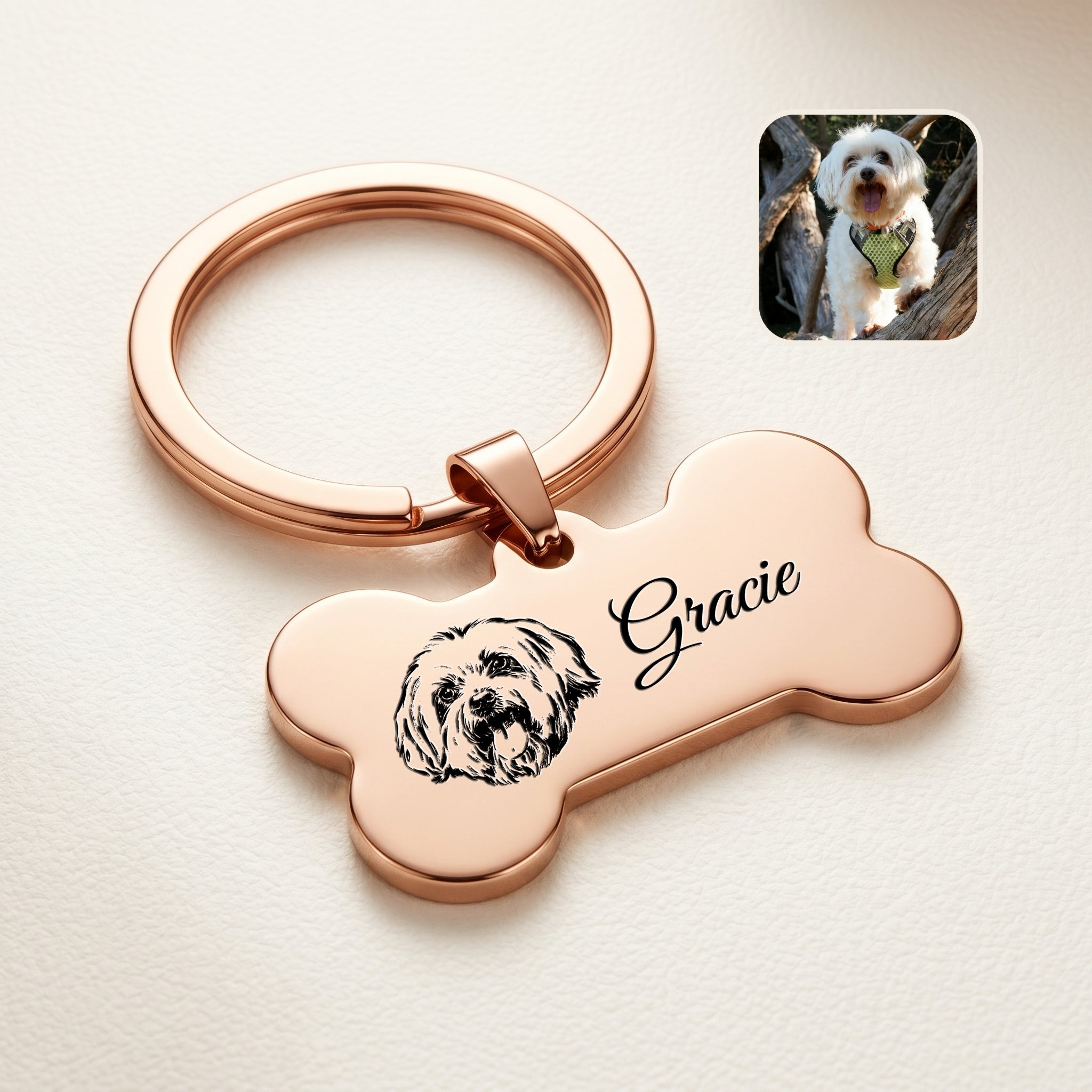 18k rose gold pet bone keychain close-up — hand-drawn pet portrait + script name laser-engraved on the front face