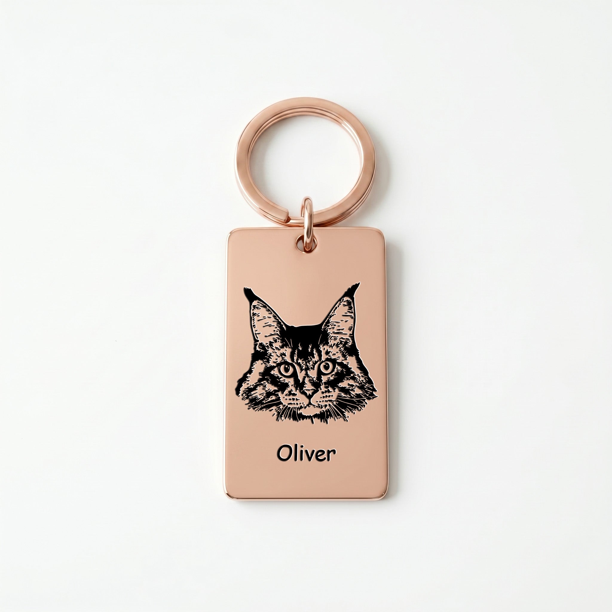 18k rose gold pet portrait plate keychain on white background, cat portrait and name engraved on the rectangular steel plate