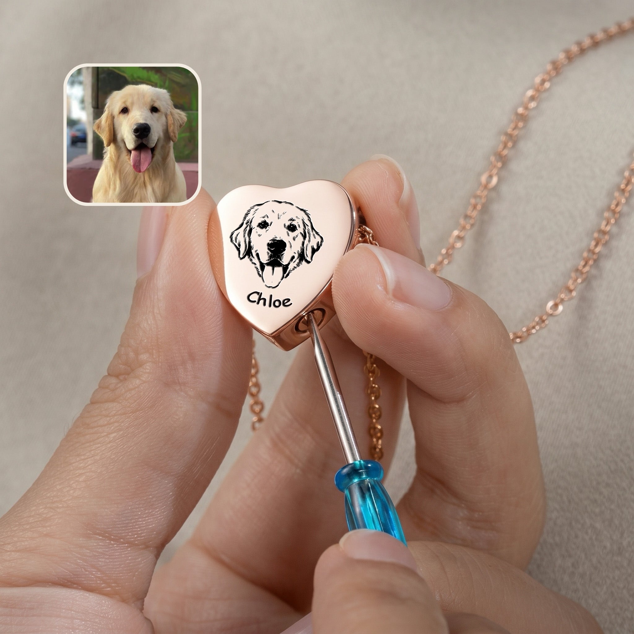 18k rose gold heart urn pendant held in hand with screwdriver showing screw cap opening for ashes