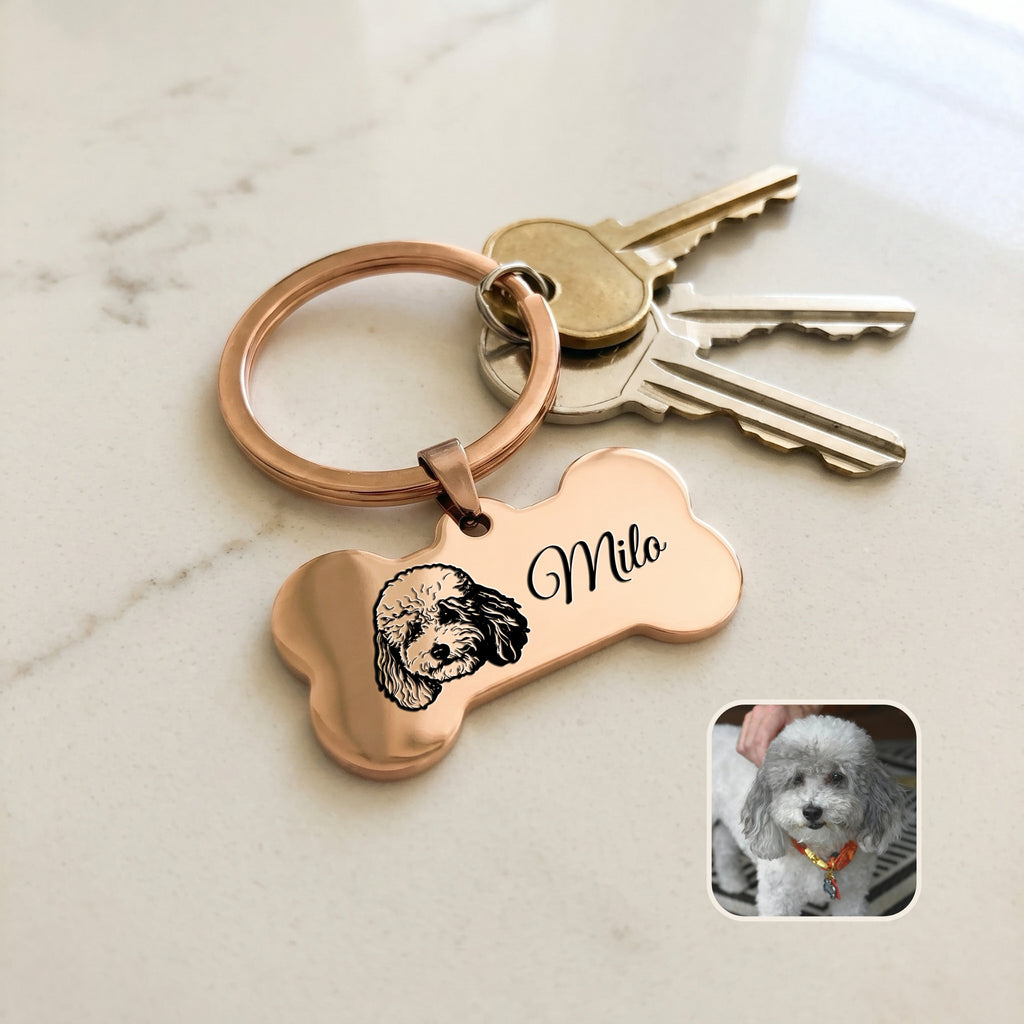 18k rose gold pet bone keychain staged on a countertop with keys — everyday-carry pocket scene