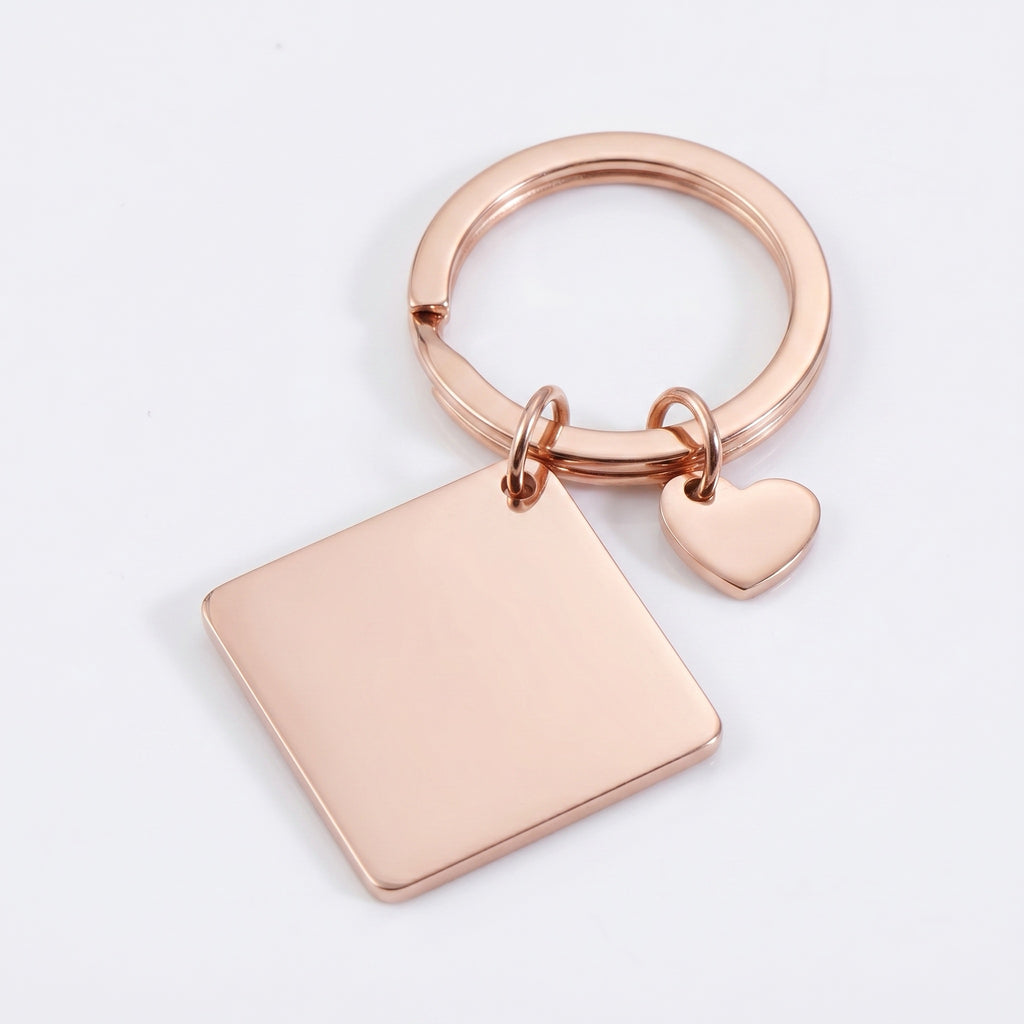 18k rose gold pet portrait square keychain flat lay showing polished square plate and heart charm