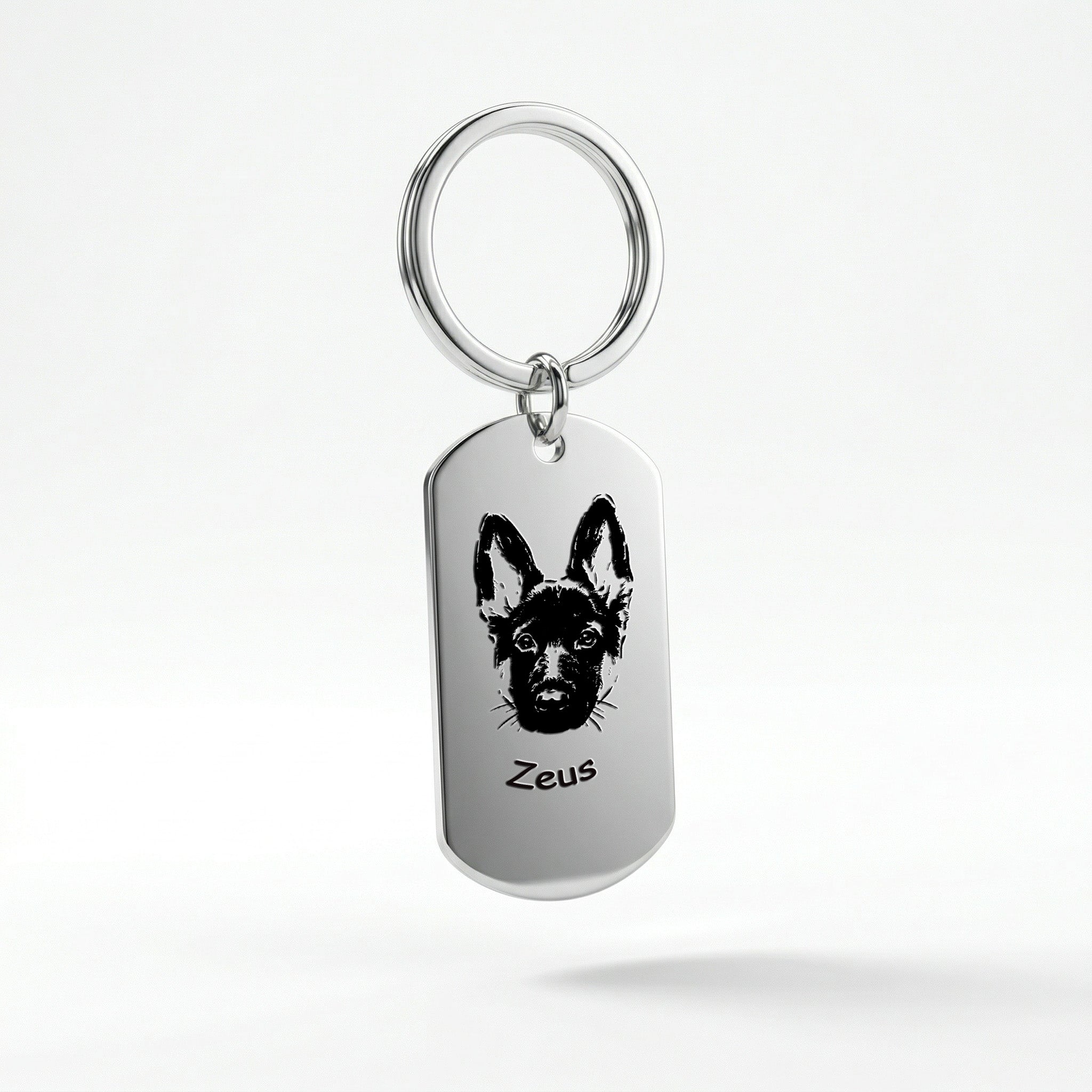 Rhodium plated pet portrait dog tag keychain floating on white background with soft shadow, product detail