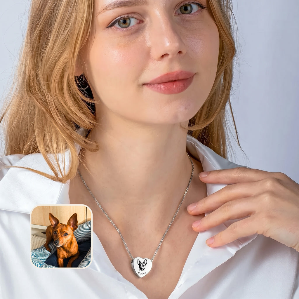 Woman wearing rhodium pet photo heart urn necklace at neckline with pet photo reference inset