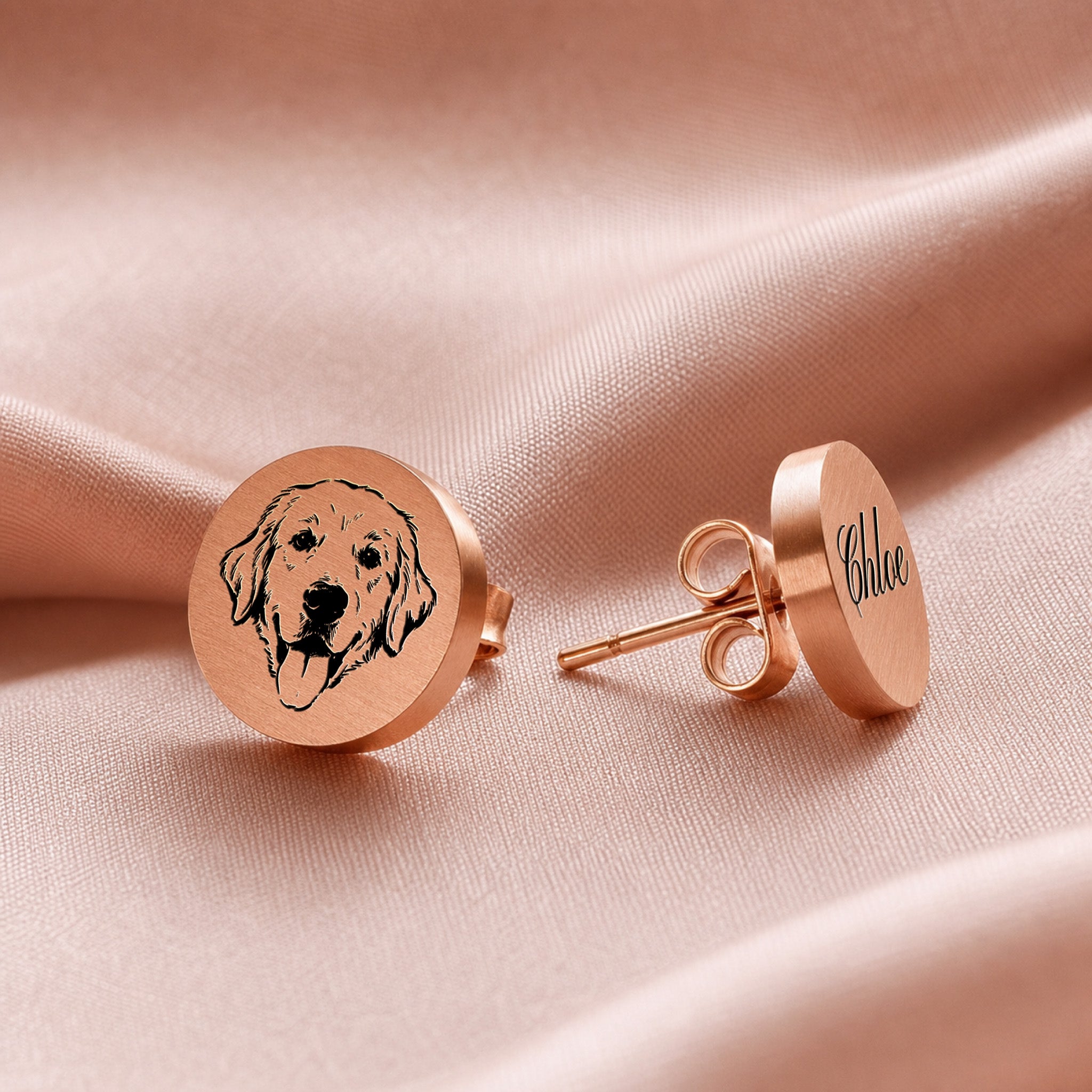 Rose gold pet portrait stud earrings as a pair, hand-drawn portrait on one disc stud and name in script on the other