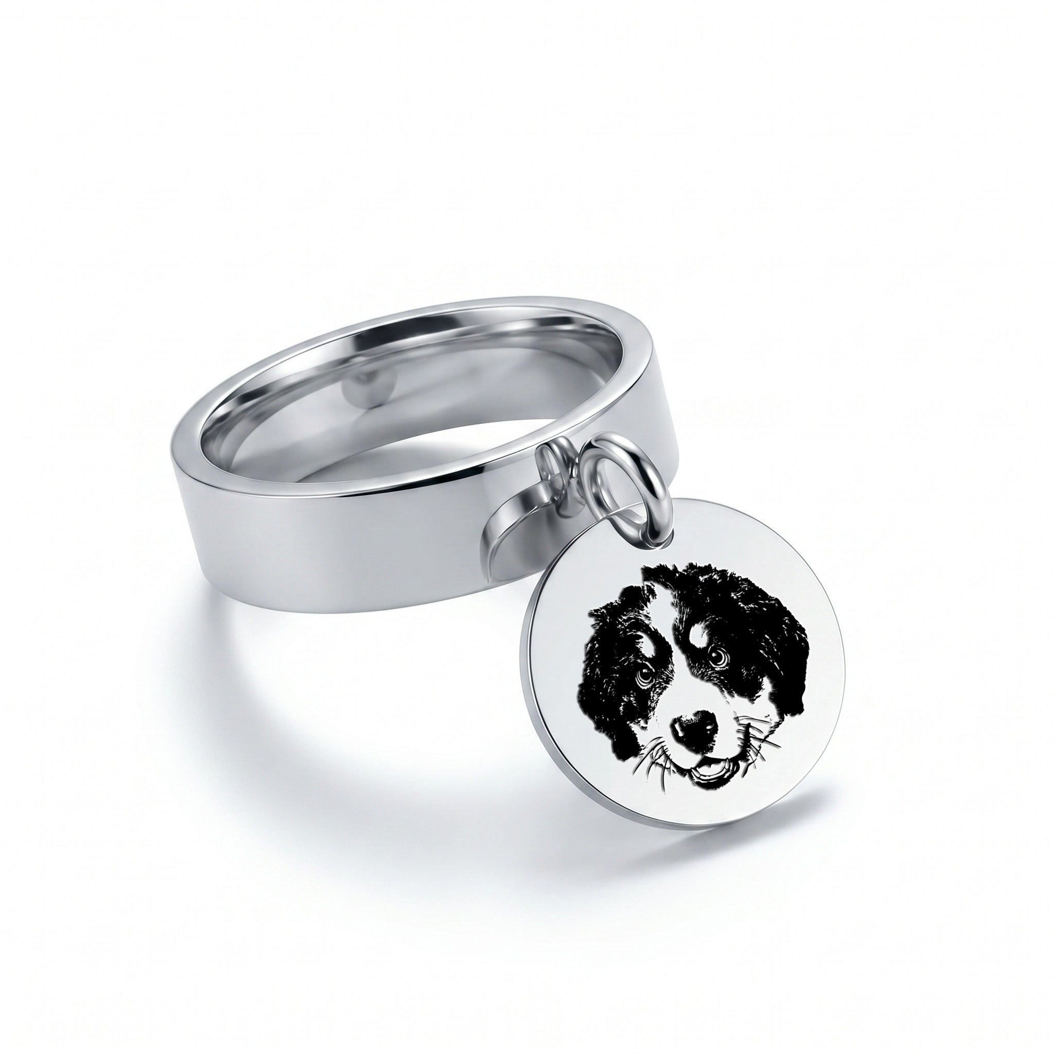 Silver-tone disc ring with an engraved pet portrait, shown alone on a white studio background
