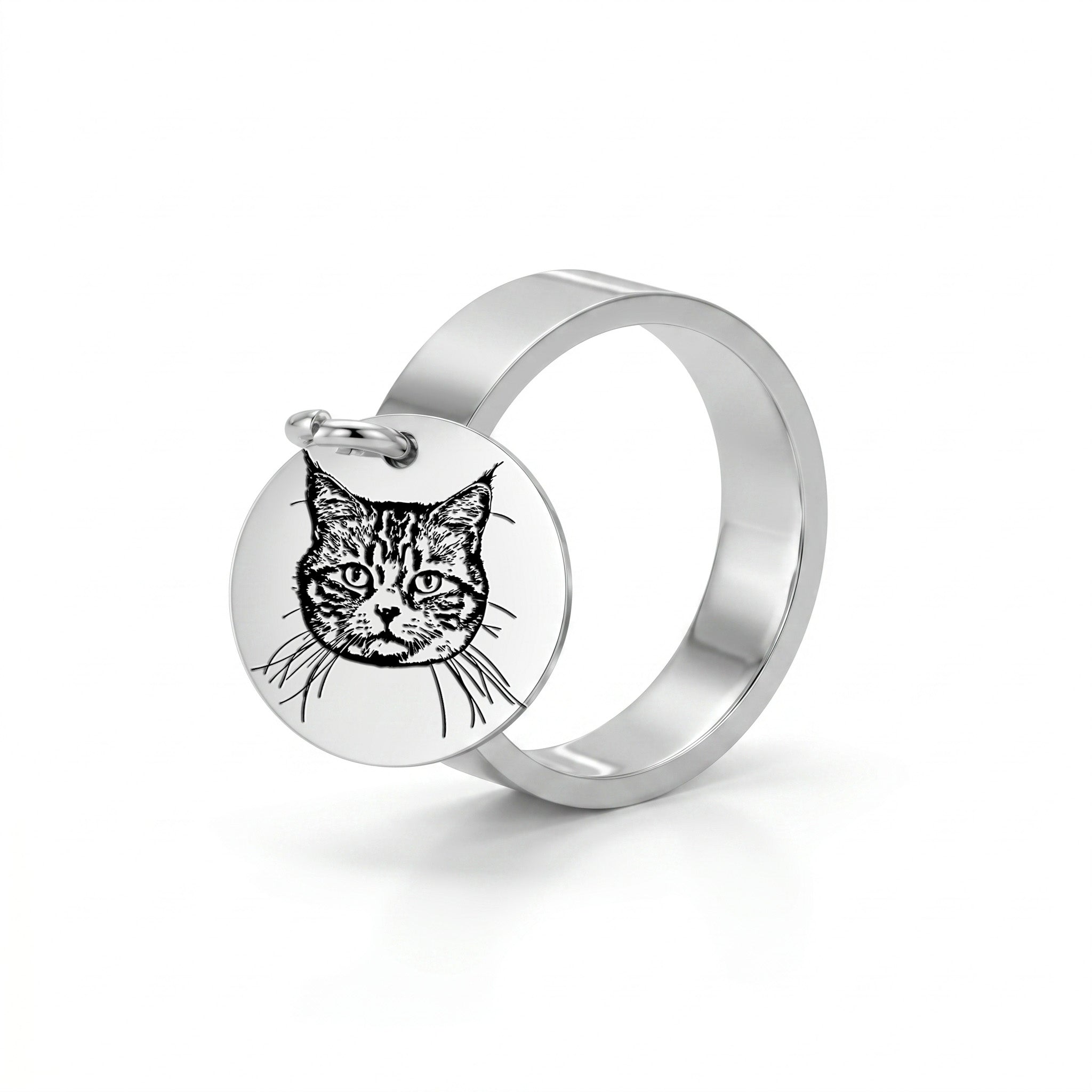 Silver-tone wide-band ring with a dangling pet-portrait disc charm, on a white studio background