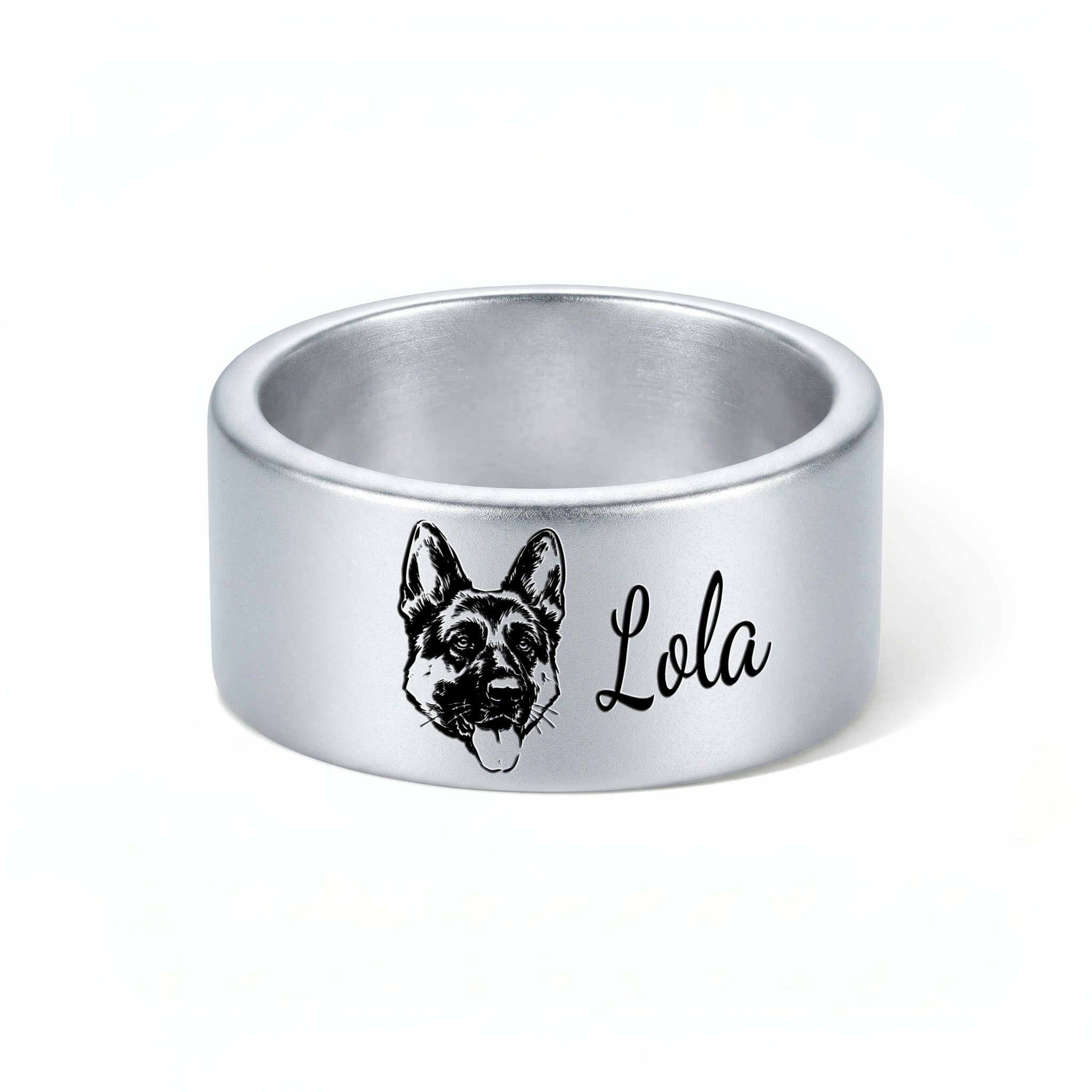 Single silver wide band pet ring on a near-white background, engraved hand-drawn portrait and script name