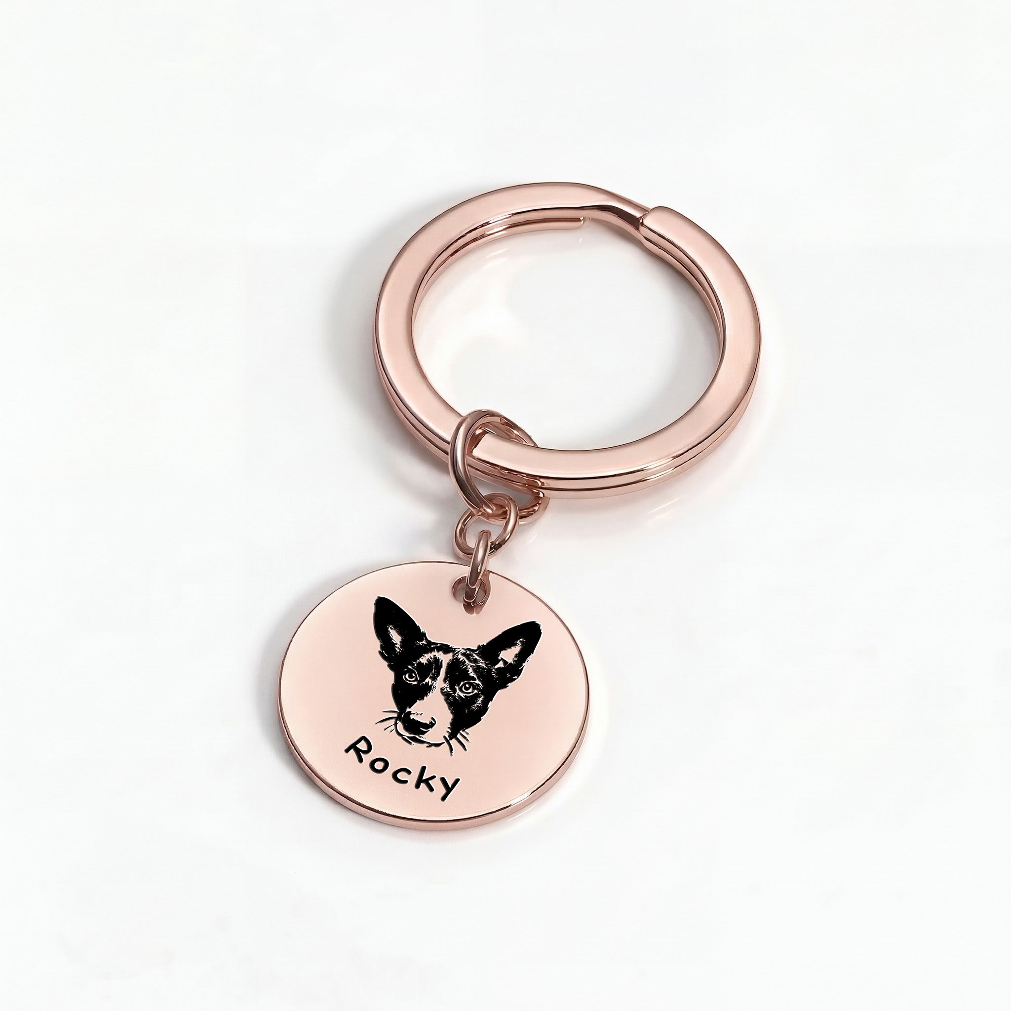 18k rose gold pet face keychain — round disc with hand-drawn pet portrait engraved, surgical steel base