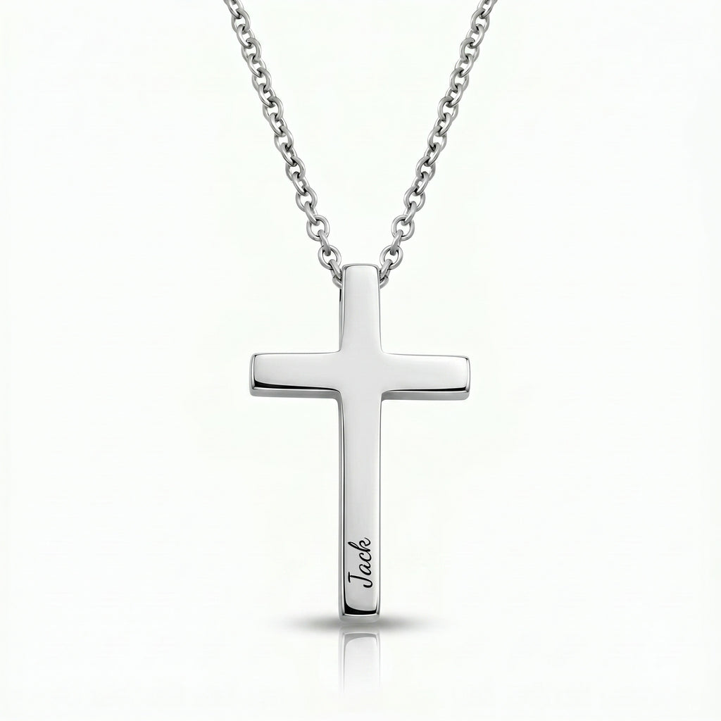 Rhodium silver cross necklace with pet name engraved in script on white background