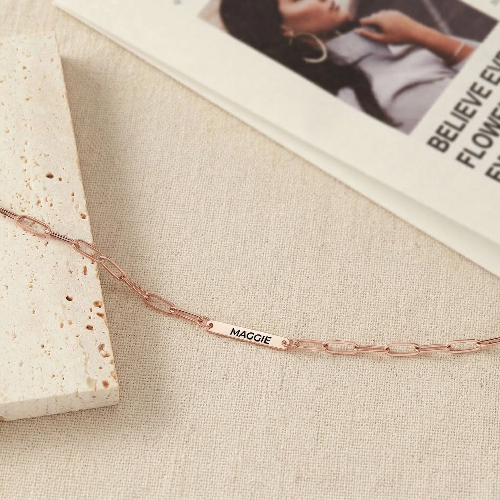 Rose gold paperclip chain pet name necklace with one engraved pet name bar, product view