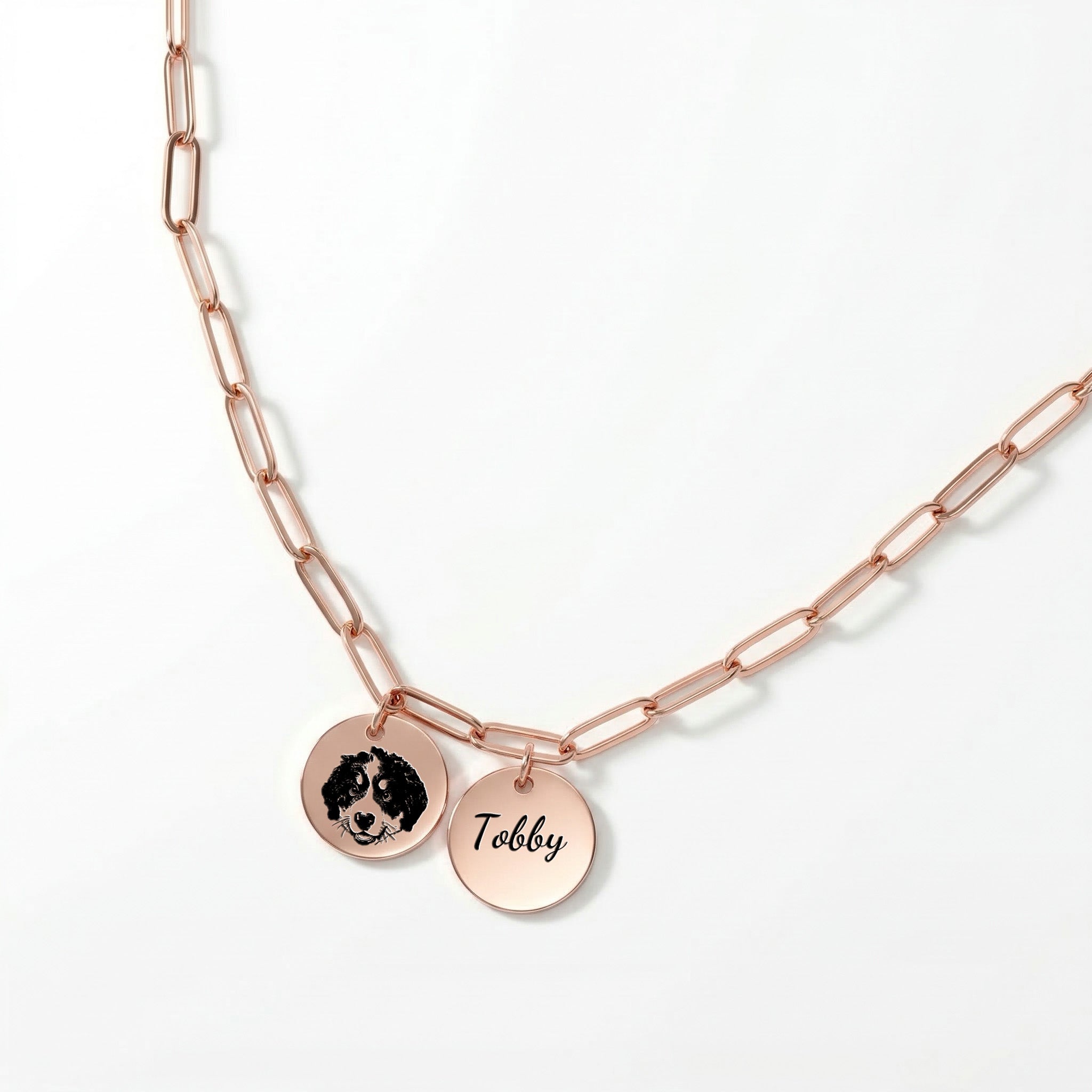 Rose gold paperclip chain necklace with dual disc pendants featuring pet portrait and name engraving