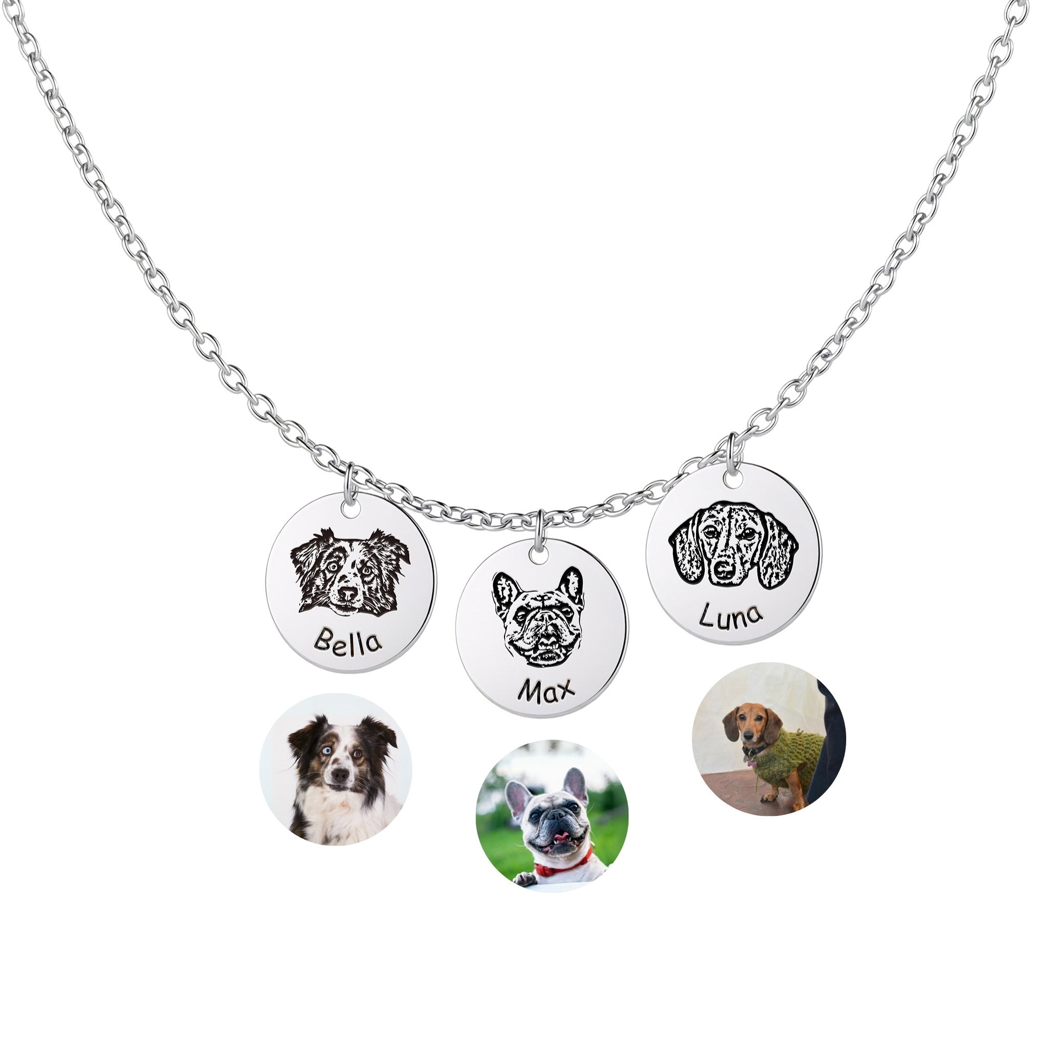 Three silver pet face disc pendants with hand-drawn portrait engravings on white background