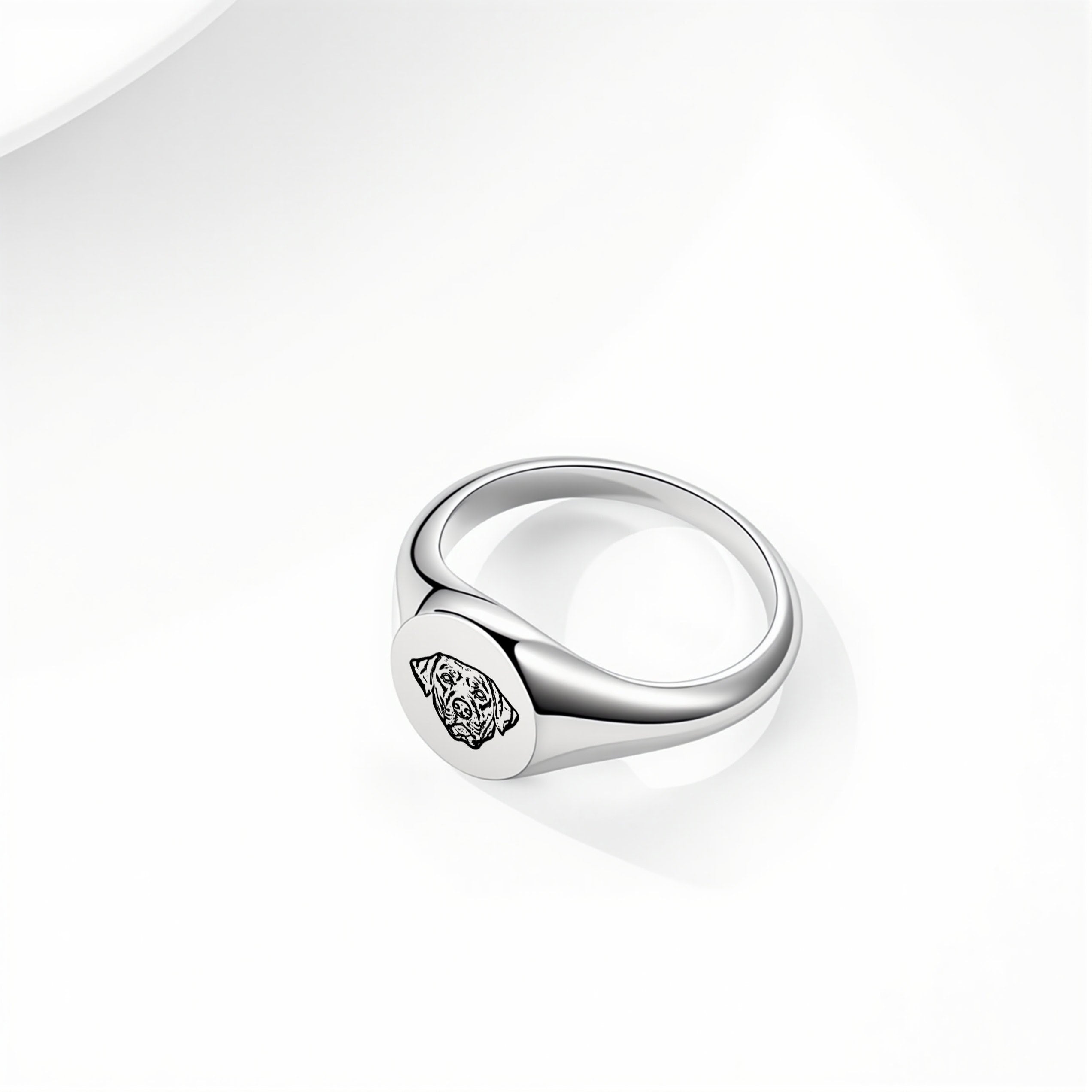 Silver pet face ring with laser-engraved portrait on a signet-style band, white background