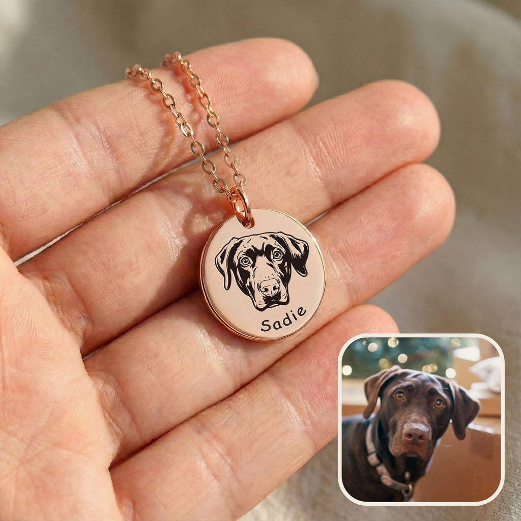 Hand holding rose gold pet face necklace with hand-drawn portrait and inset pet photo