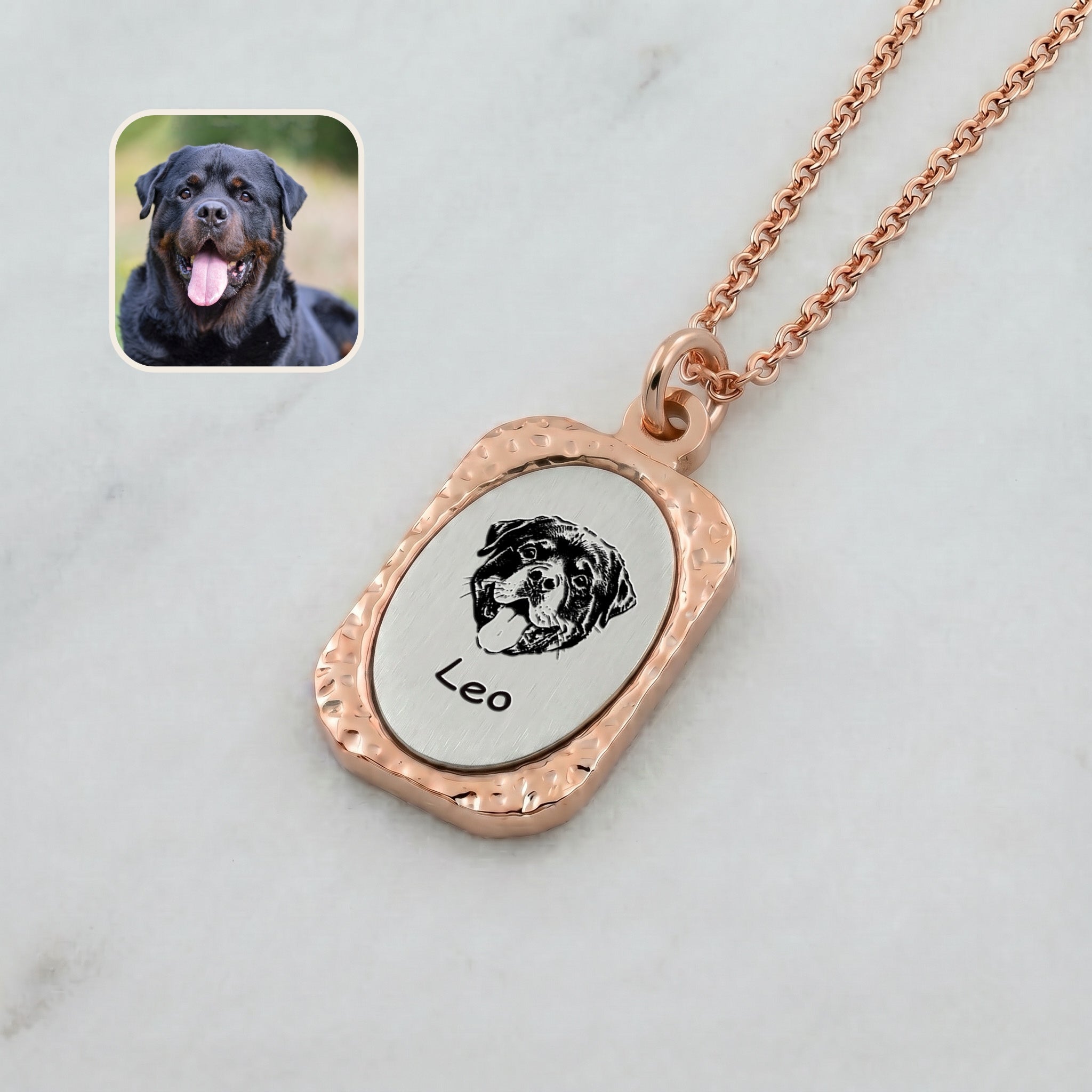 Close-up of 18K rose gold vintage tag pendant with hand-drawn pet portrait showing hammered frame texture