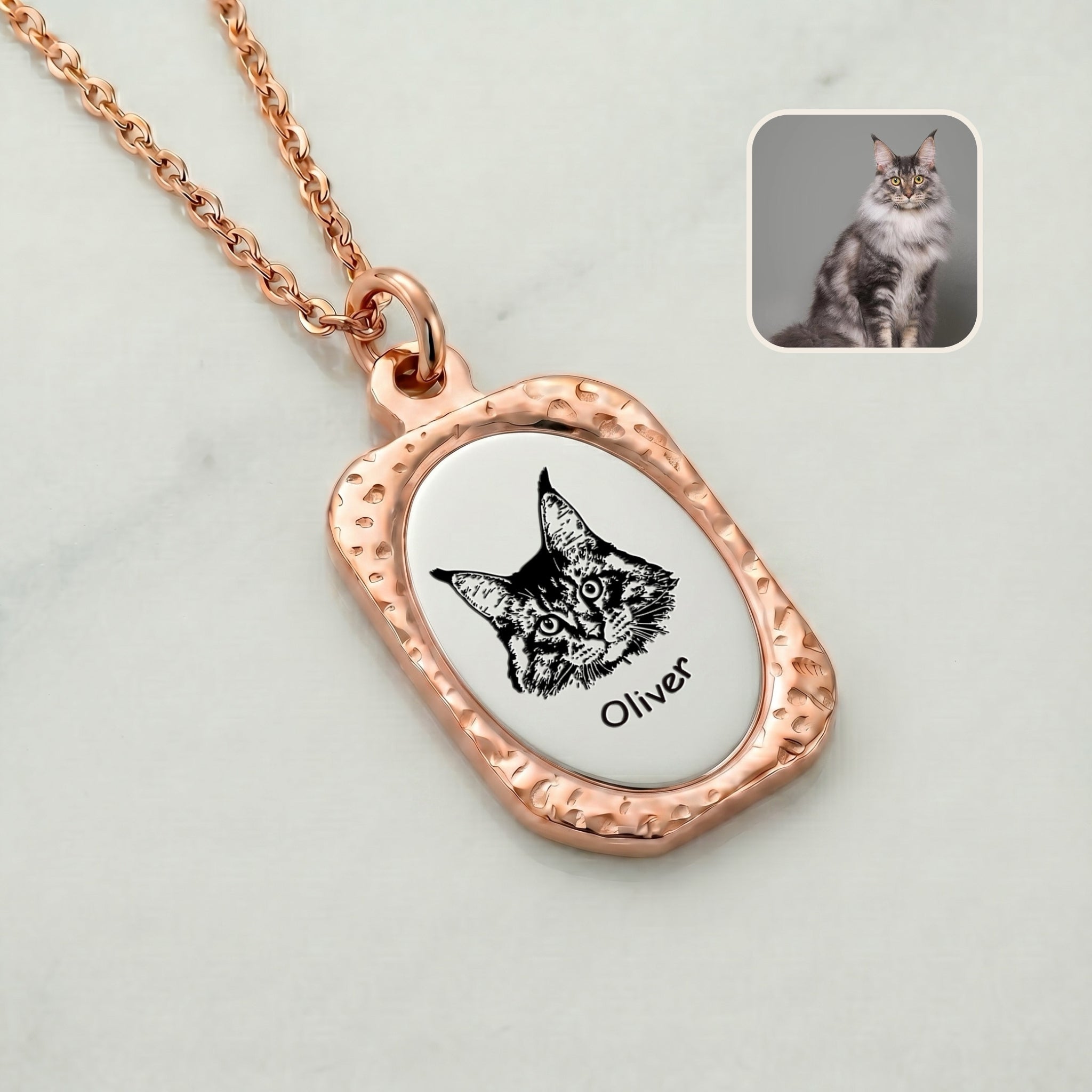 Close-up of 18K rose gold pet memorial pendant with hand-drawn portrait on brushed silver face