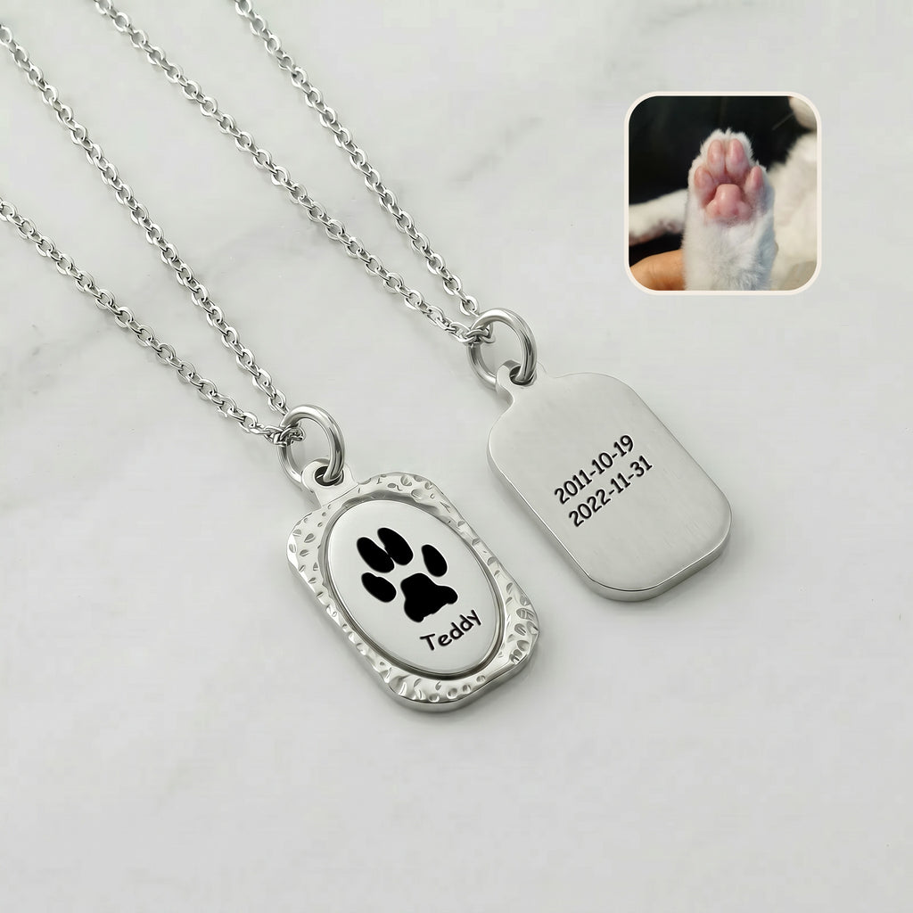 Front and back view of rhodium vintage tag pendant showing portrait engraving and memorial dates