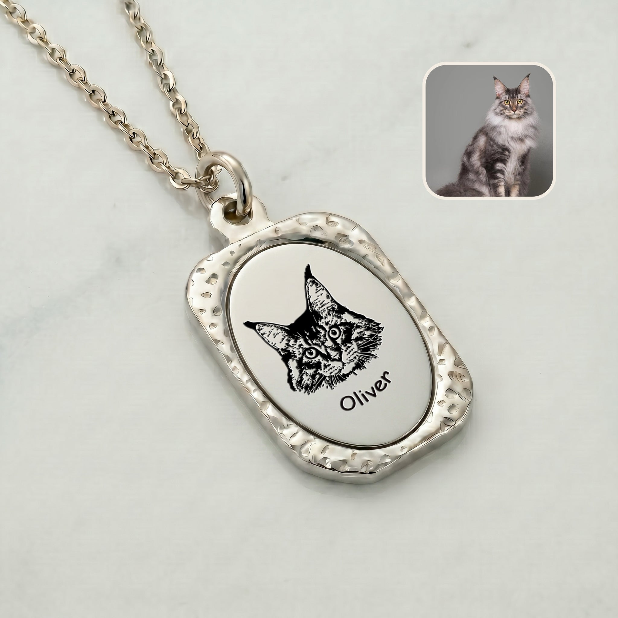 Close-up of rhodium vintage tag pendant with hand-drawn pet portrait showing hammered frame detail