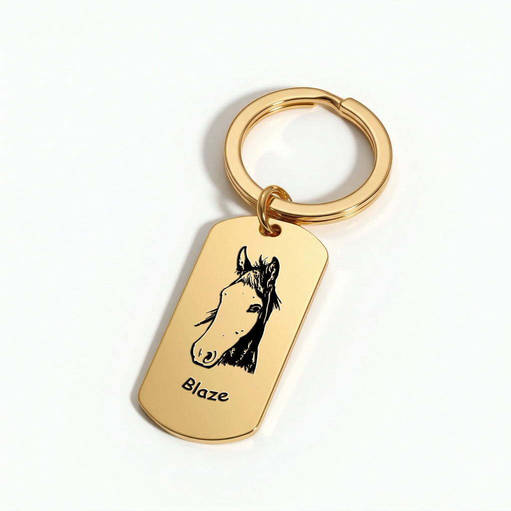18K gold pet portrait dog tag keychain flat-lay on softly lit white surface, editorial product detail
