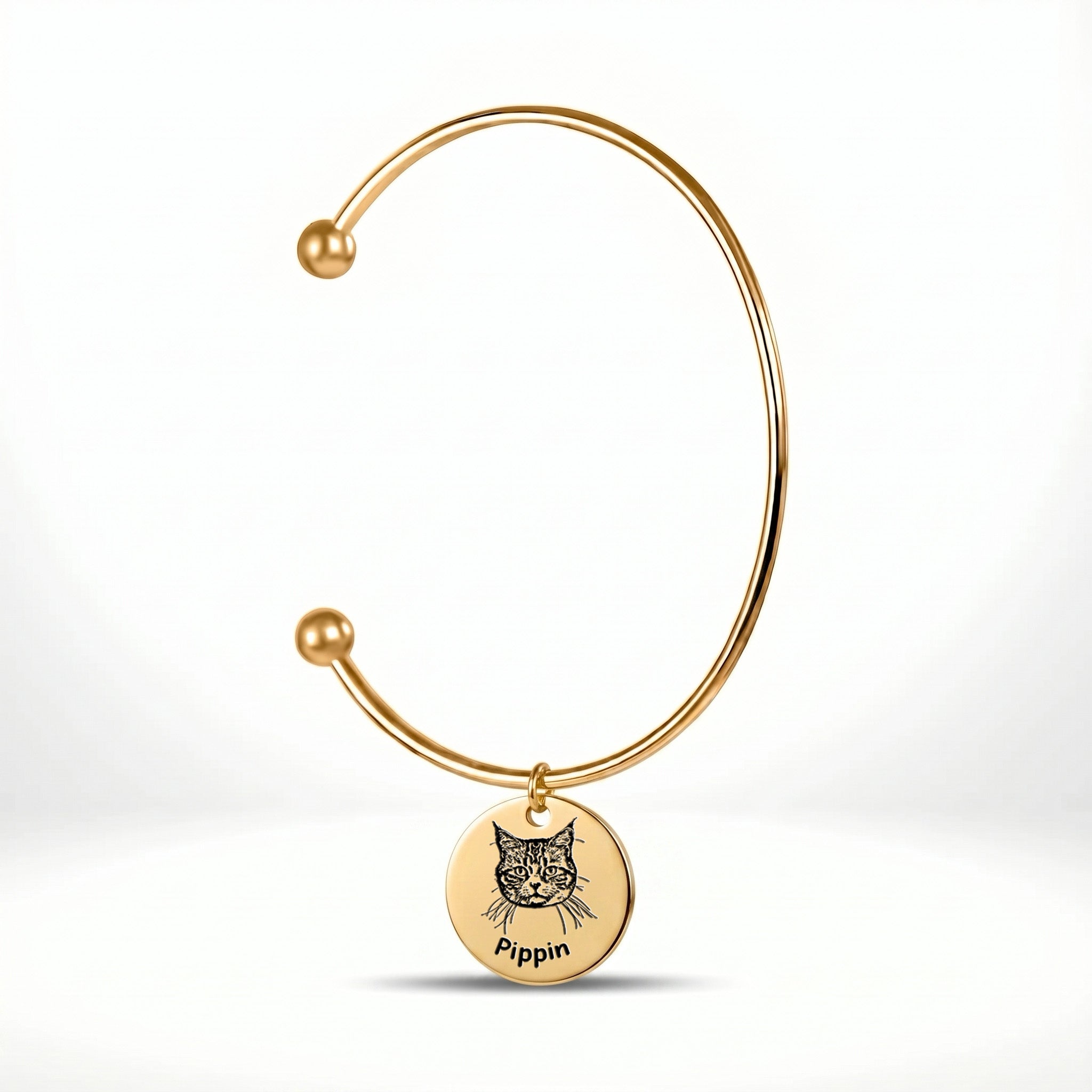 18K gold-plated open cuff bracelet with engraved pet portrait disc charm on a white background
