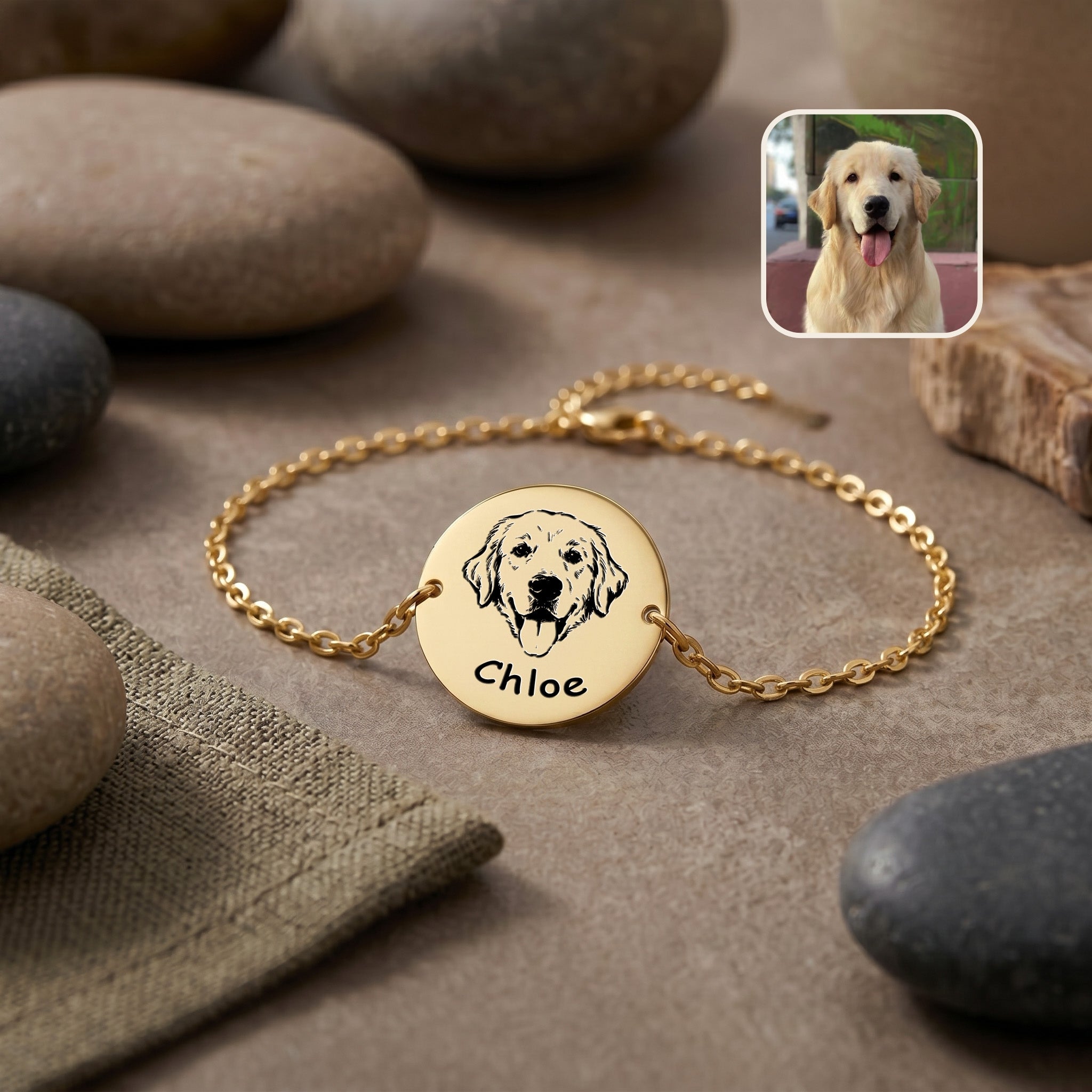 Gold-plated pet portrait chain bracelet flat lay on stone surface, hand-drawn golden retriever portrait on disc, with inset pet photo