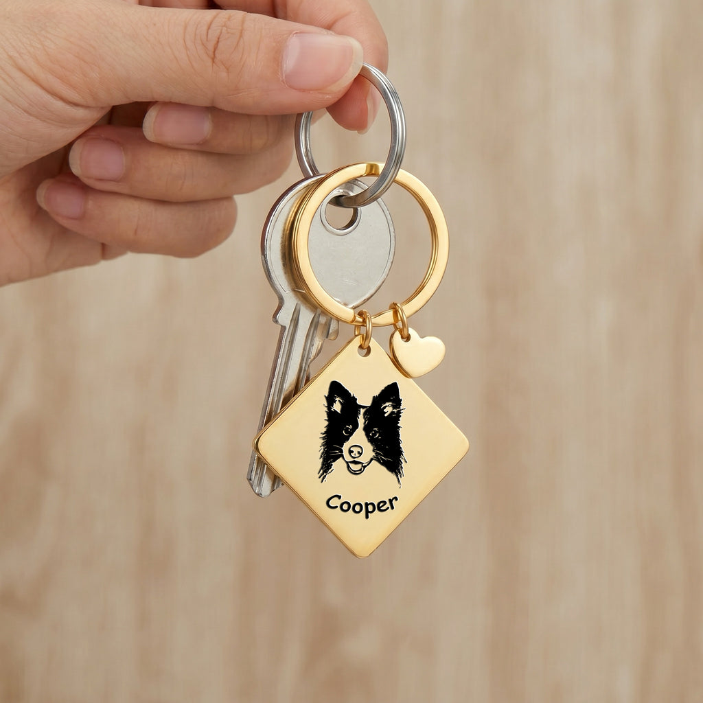 18k gold pet portrait square keychain clipped to keys with hand-drawn portrait visible