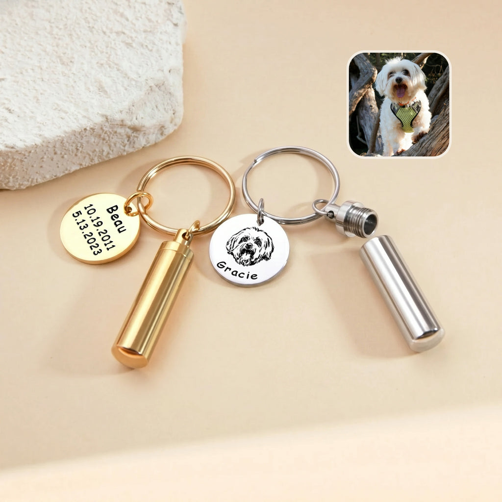 Pet portrait and ashes cylinder keychain shown in both finishes with one screw-cap cylinder open, alongside a disc demonstrating the optional back-side name and dates engraving